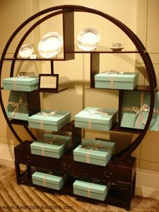 Live auction item display Tiffany dishes